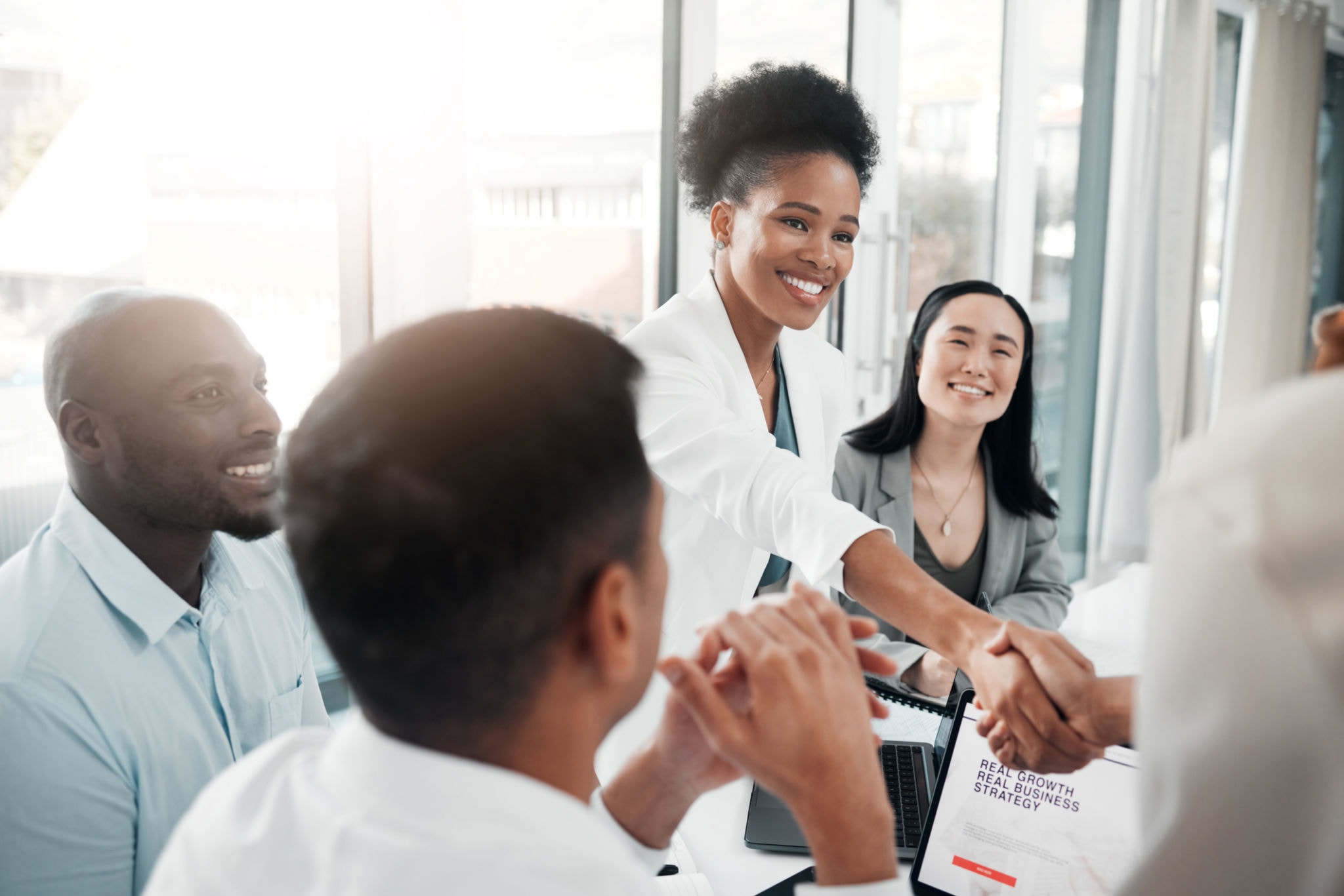 Healthcare professionals in a welcoming meeting